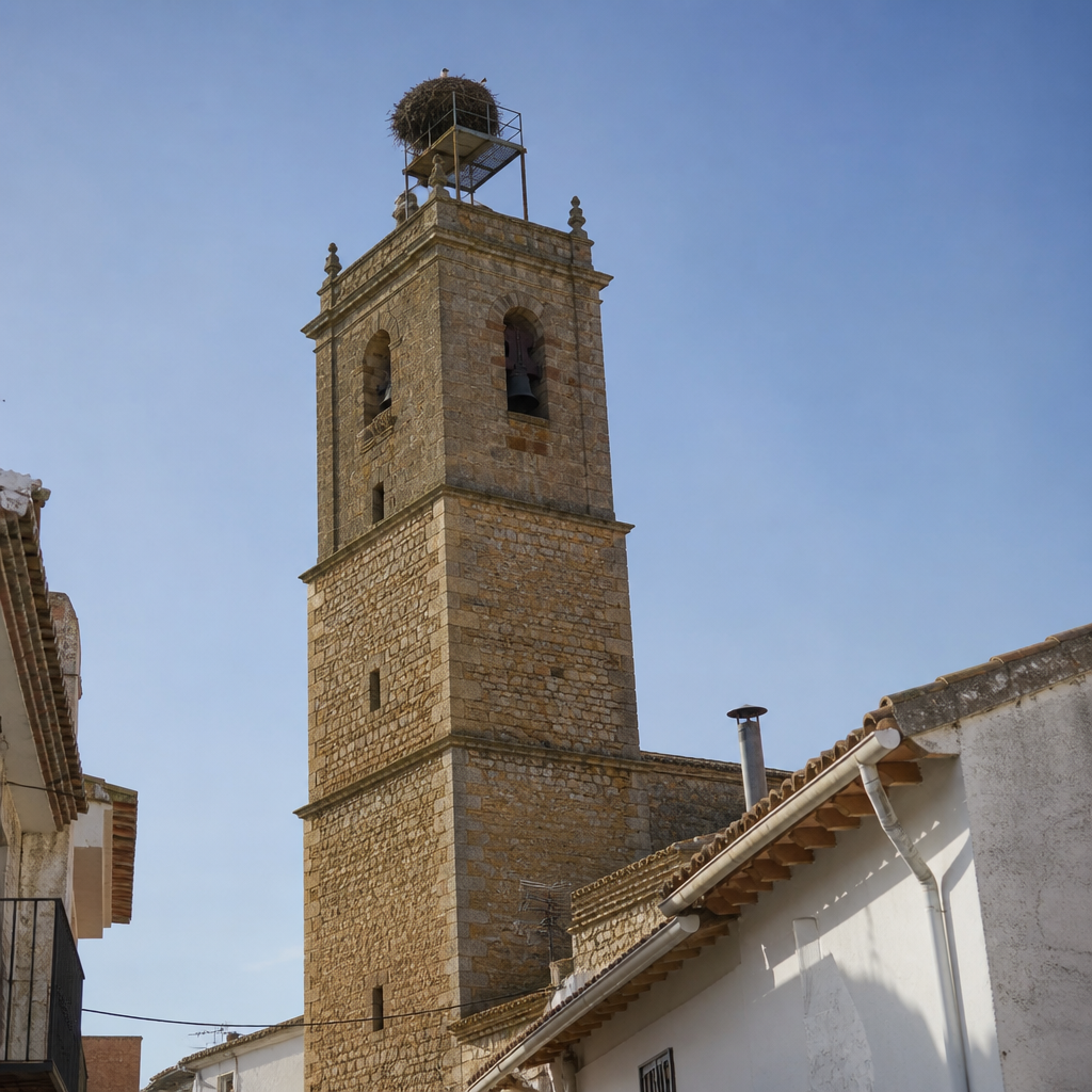 Torre y campanario de la iglesia de la Encarnación de El Viso con nido de cigüeña, qué ver en El Viso