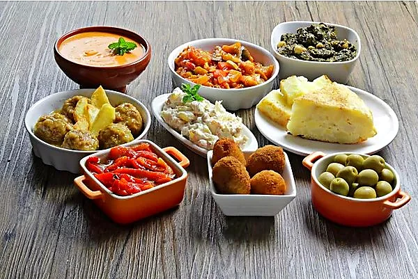 Recreación ilustrativa: Clase privada de cocina mediterránea y catalana